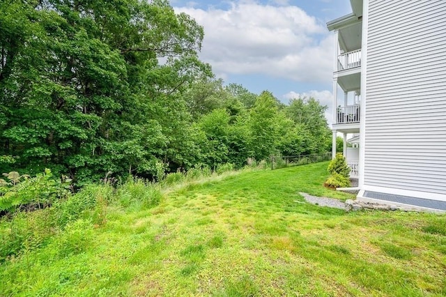 3302 Briarwood Vlg Unit 3302, Clinton, MA 01510 - view of grassy yard featuring a balcony