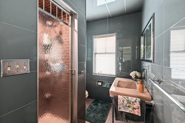 70 Hawthorn St, New Bedford, MA 02740 - bathroom with a shower stall, toilet, vanity, and tile walls