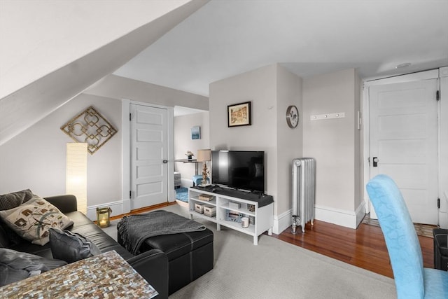 70 Hawthorn St, New Bedford, MA 02740 - living room with radiator, baseboards, and wood finished floors