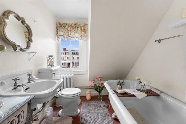 70 Hawthorn St, New Bedford, MA 02740 - bathroom with a freestanding tub, radiator, and toilet