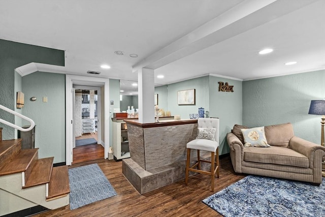 70 Hawthorn St, New Bedford, MA 02740 - living room with wood finished floors, a bar, a textured wall, stairway, and recessed lighting