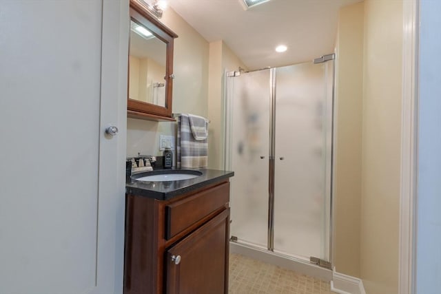 70 Hawthorn St, New Bedford, MA 02740 - bathroom with a stall shower, vanity, and recessed lighting