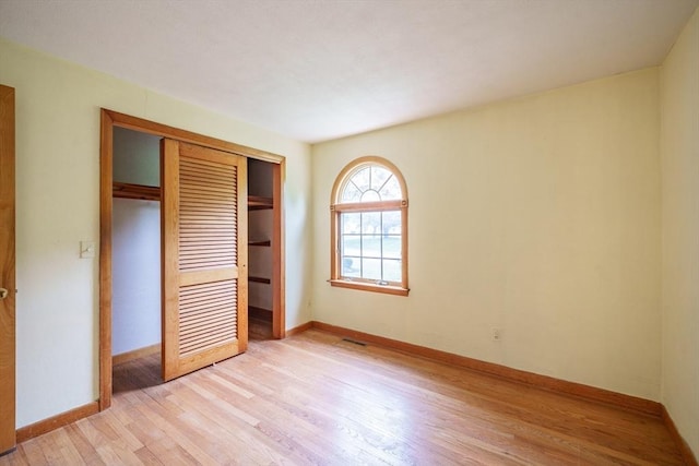 136 Butternut Hollow Rd, West Springfield, MA 01089 - unfurnished bedroom with light wood finished floors, a closet, and baseboards
