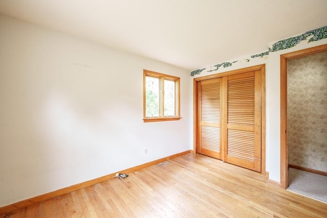 136 Butternut Hollow Rd, West Springfield, MA 01089 - unfurnished bedroom featuring baseboards, light wood-type flooring, and a closet