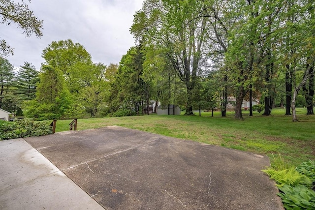 136 Butternut Hollow Rd, West Springfield, MA 01089 - view of patio with an outbuilding and a storage unit