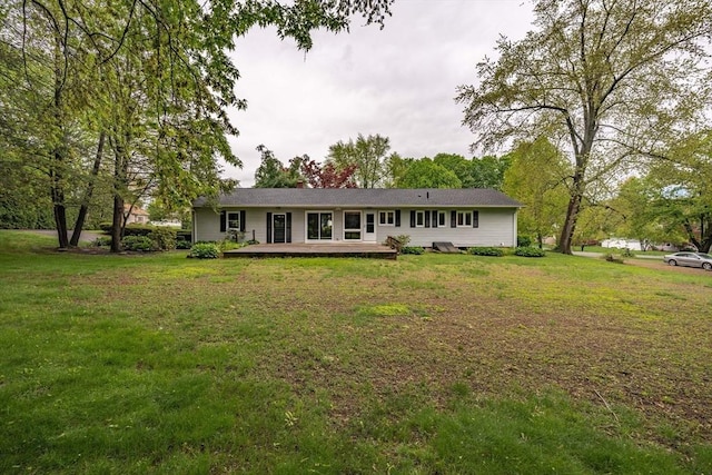 136 Butternut Hollow Rd, West Springfield, MA 01089 - view of front facade featuring a deck and a front yard