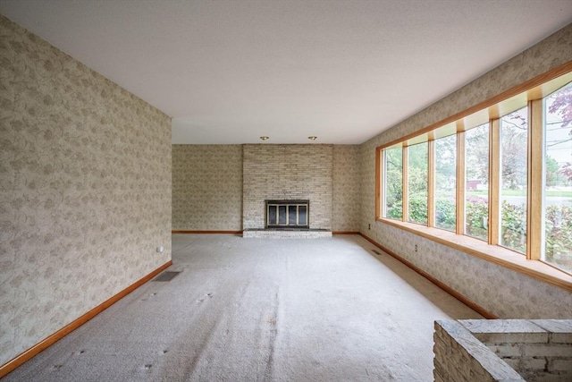 136 Butternut Hollow Rd, West Springfield, MA 01089 - unfurnished living room featuring carpet, a fireplace, and baseboards
