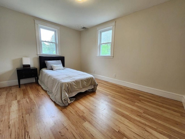 52 Walnut St, Shrewsbury, MA 01545 - bedroom with light wood-style floors and baseboards