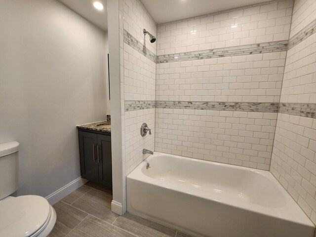 52 Walnut St, Shrewsbury, MA 01545 - full bath with toilet, vanity, shower / tub combination, tile patterned floors, and recessed lighting
