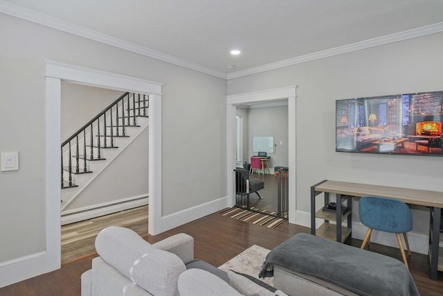 living room with baseboard heating, ornamental molding, and dark hardwood / wood-style floors