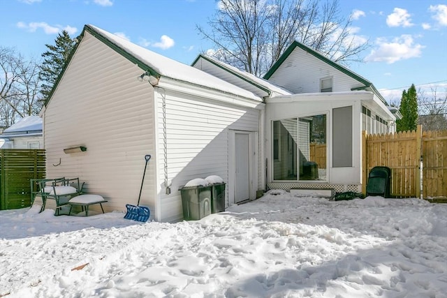 view of snow covered property