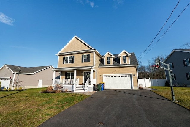 front facade with a porch, a garage, and a front yard