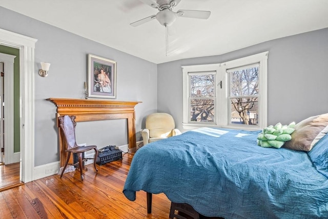 bedroom featuring ceiling fan and wood-type flooring