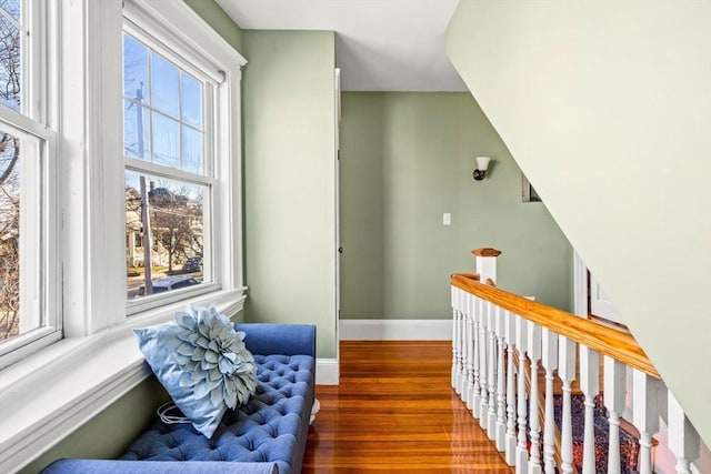 interior space featuring a wealth of natural light and hardwood / wood-style floors