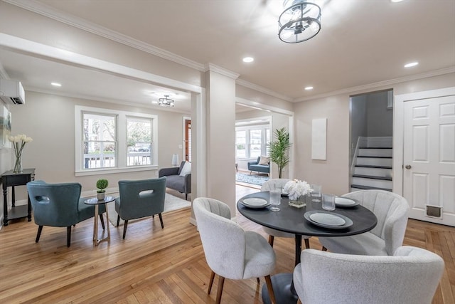 106 Stony Hill Rd, Wilbraham, MA 01095 - dining area with stairway, light wood-style flooring, an AC wall unit, and recessed lighting