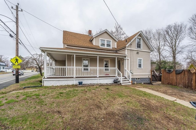 106 Stony Hill Rd, Wilbraham, MA 01095 - view of front of property featuring a porch, fence, a front yard, a chimney, and a shingled roof