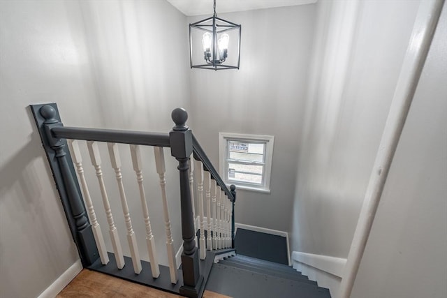 106 Stony Hill Rd, Wilbraham, MA 01095 - stairs featuring an inviting chandelier and baseboards