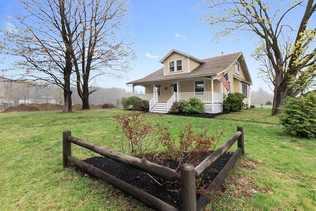 view of front of house with a front lawn and a porch