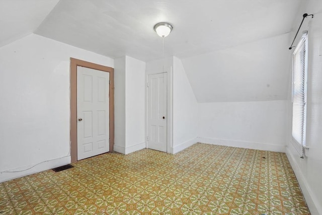 additional living space with plenty of natural light and lofted ceiling