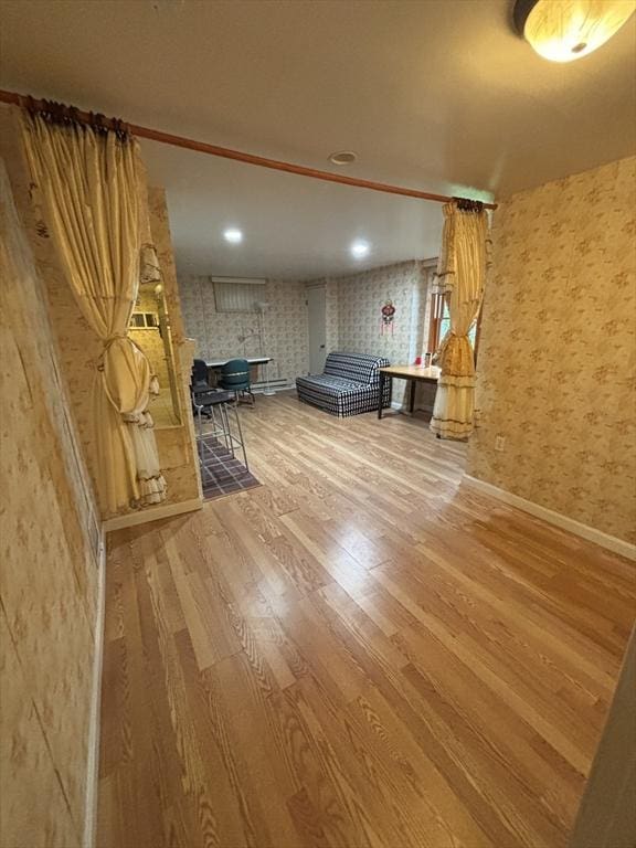 12 Inis Cir, Newton, MA 02465 - living room featuring wallpapered walls, wood finished floors, baseboards, and recessed lighting