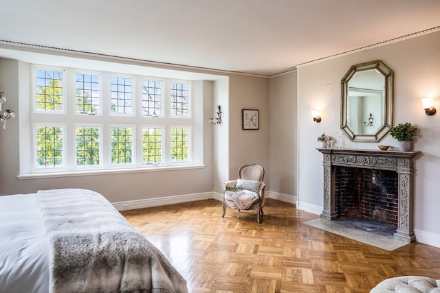 bedroom featuring parquet flooring, multiple windows, and crown molding