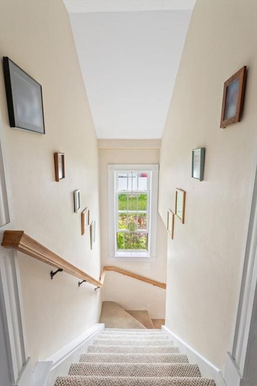 9 Emerson Ct, Winchester, MA 01890 - stairway featuring vaulted ceiling and carpet