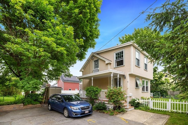 9 Emerson Ct, Winchester, MA 01890 - view of front of house featuring a porch