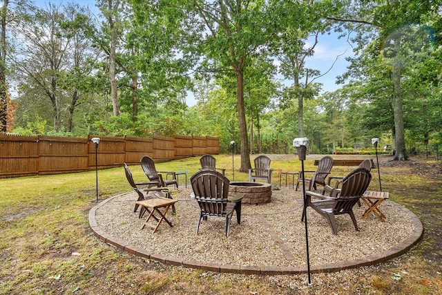 view of patio / terrace with an outdoor fire pit