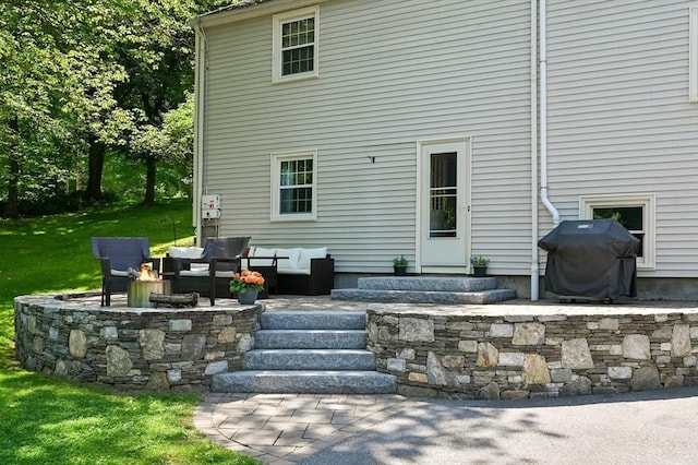 241 W Main St, Westborough, MA 01581 - back of property with a lawn and an outdoor living space with a fire pit