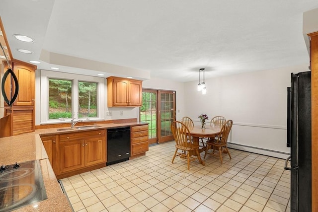 369 Border Rd, Concord, MA 01742 - kitchen featuring black appliances, a baseboard heating unit, recessed lighting, light tile patterned flooring, and decorative light fixtures