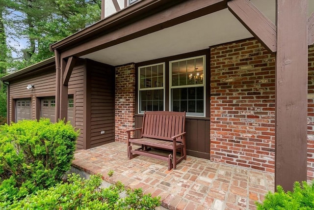 369 Border Rd, Concord, MA 01742 - covered porch featuring a garage