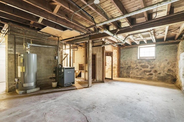 basement featuring gas water heater