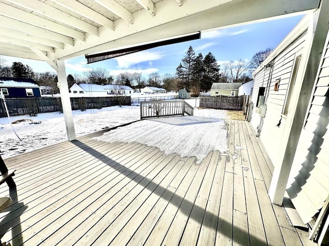 view of snow covered deck