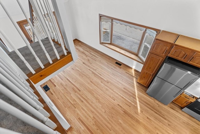 stairway with wood-type flooring