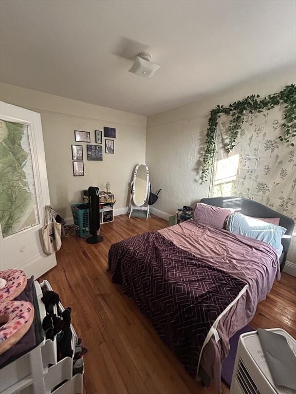 1691 Commonwealth Unit 32, Boston, MA 02135 - bedroom with wood finished floors and baseboards