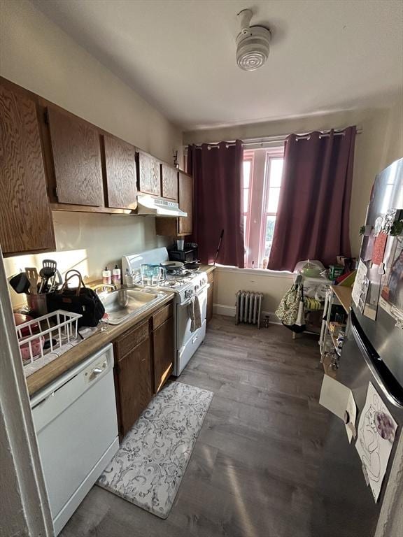 1691 Commonwealth Unit 32, Boston, MA 02135 - kitchen with radiator, white appliances, under cabinet range hood, and a sink