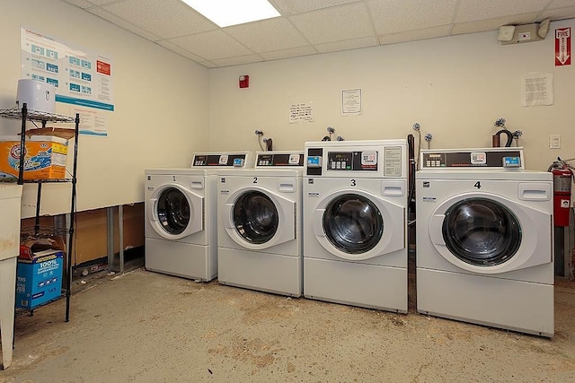 community laundry room with independent washer and dryer