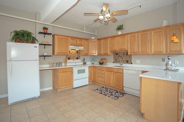 kitchen featuring white appliances, ceiling fan, a sink, light countertops, and under cabinet range hood