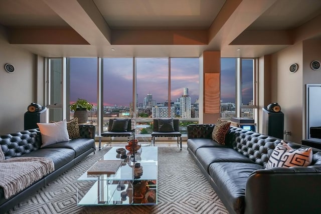 living room featuring a wall of windows