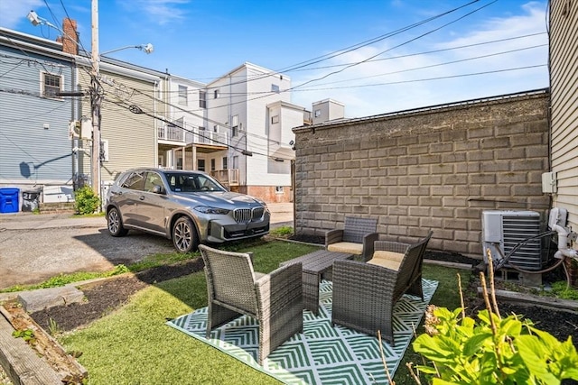 view of yard featuring central AC