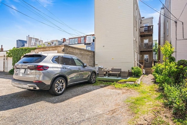 view of property exterior with an outdoor living space