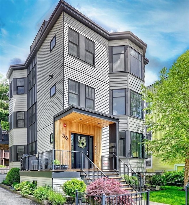 36 Hall Unit 1, Boston, MA 02130 - view of front of house with a fenced front yard