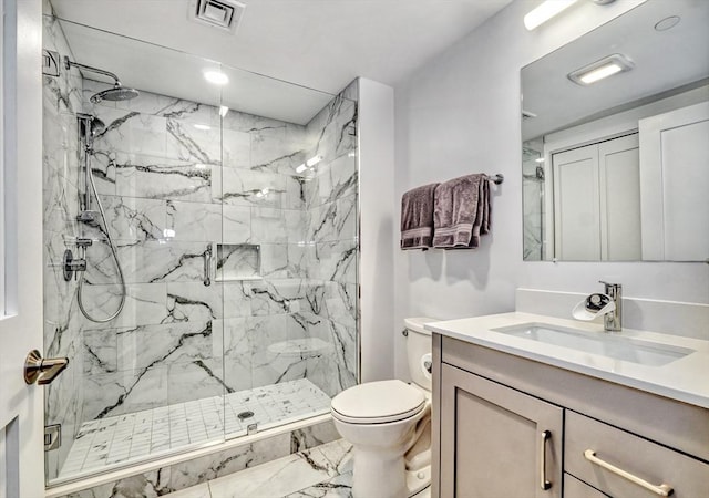 36 Hall Unit 1, Boston, MA 02130 - full bathroom featuring marble look tiles, vanity, toilet, and a marble finish shower
