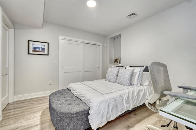 36 Hall Unit 1, Boston, MA 02130 - bedroom featuring a closet, light wood-style flooring, and baseboards