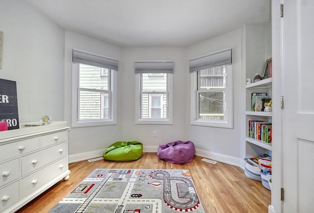 36 Hall Unit 1, Boston, MA 02130 - rec room with light wood-style floors and baseboards