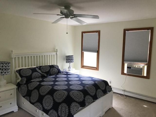 bedroom with ceiling fan, baseboard heating, carpet, and cooling unit