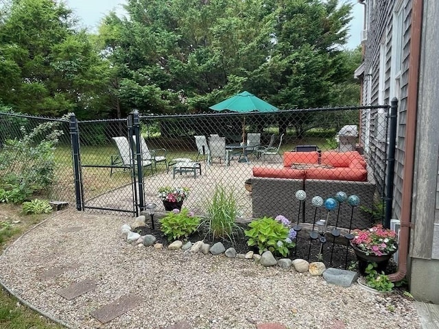 exterior space featuring a gate and fence