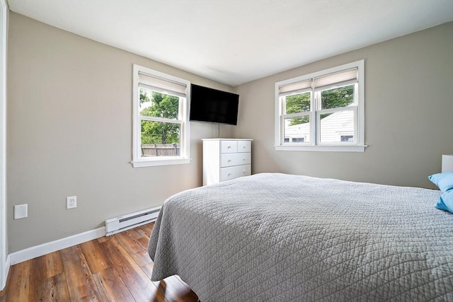 44 Macarthur Ln, Marshfield, MA 02050 - bedroom with a baseboard heating unit, wood finished floors, multiple windows, and baseboards