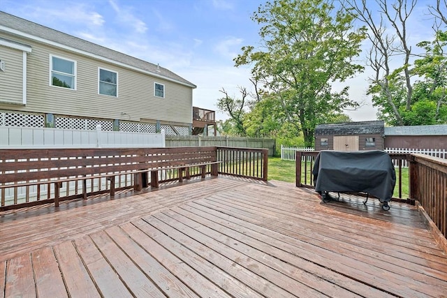 44 Macarthur Ln, Marshfield, MA 02050 - deck with grilling area and a fenced backyard