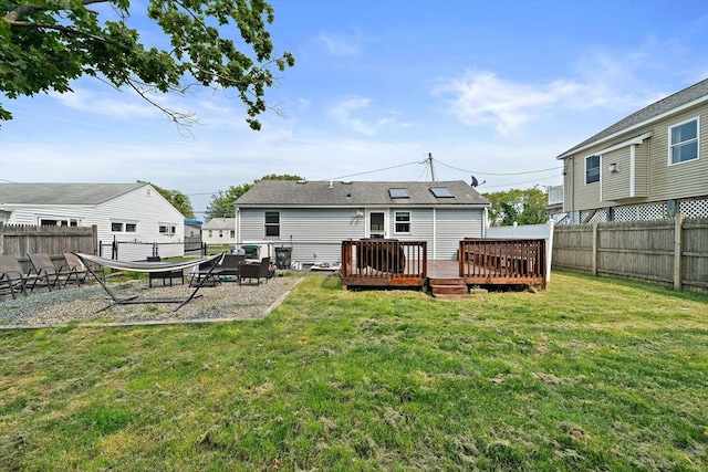 44 Macarthur Ln, Marshfield, MA 02050 - rear view of property with a deck and a patio area